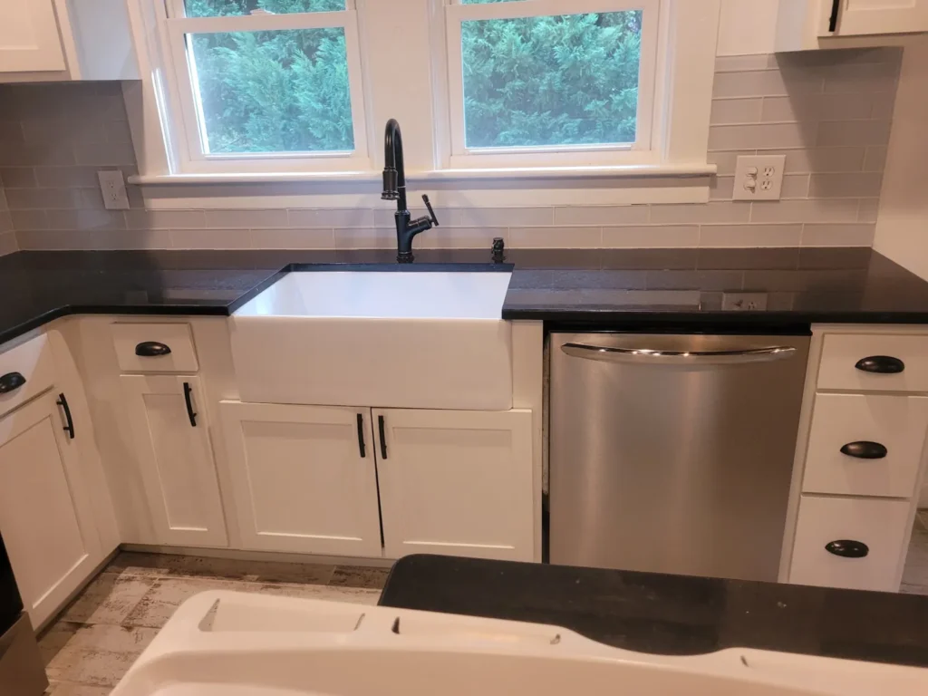 Kitchen sink and faucet after a Flow Logic plumbing repair